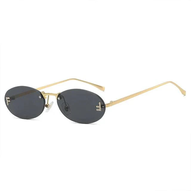 Valenzora | Ovale Sonnenbrille mit goldenen Akzenten und dezenten Steinen