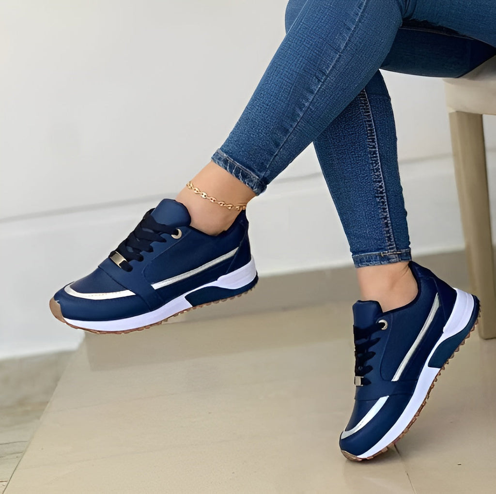 Valenzora | Stylish black sneakers with metallic accents for women