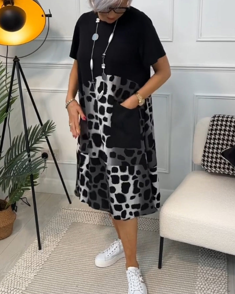 Valenzora | Short-sleeved, printed dress with a round neckline