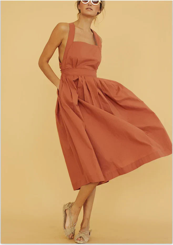 Valenzora | Backless, pleated dress with large pockets