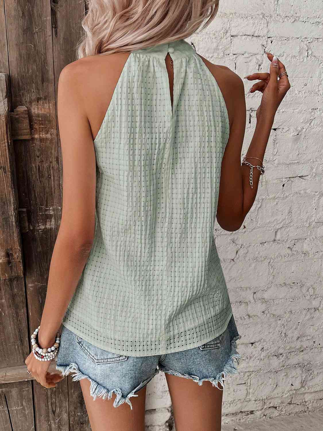 Valenzora | Halterneck top with polka dot detail