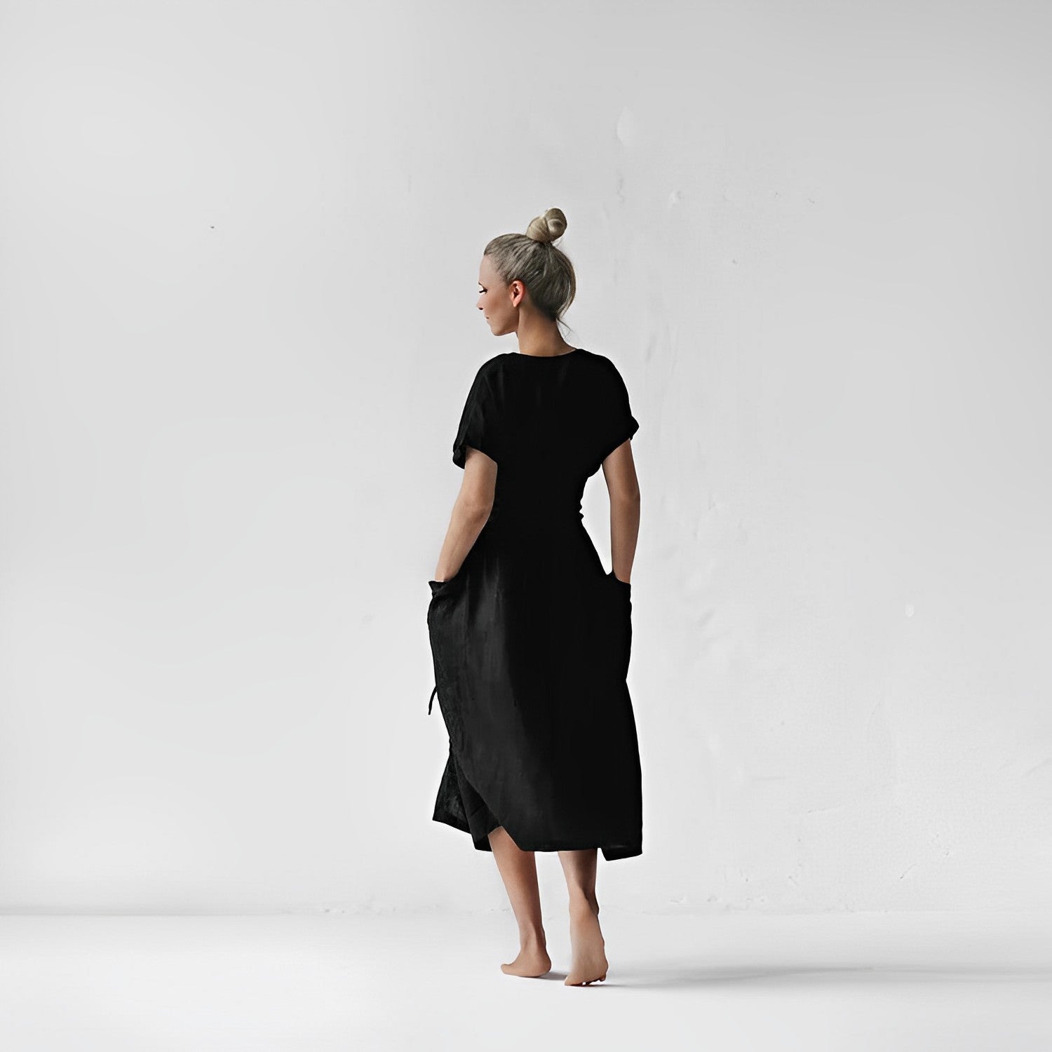 Valenzora - Knit dress with lacing and pockets