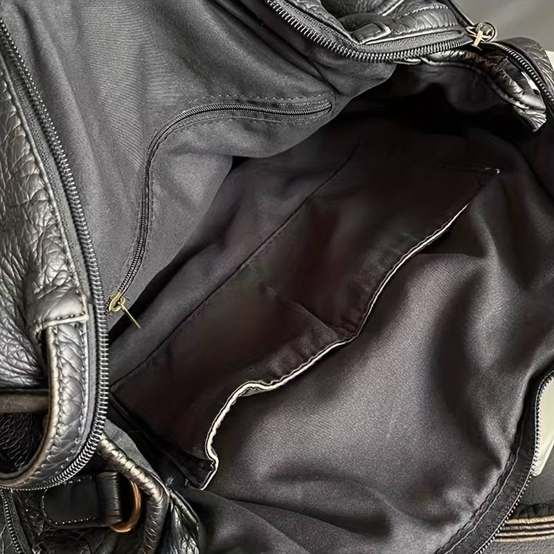 Obsidian - Luxuriöse schwarze Ledertasche